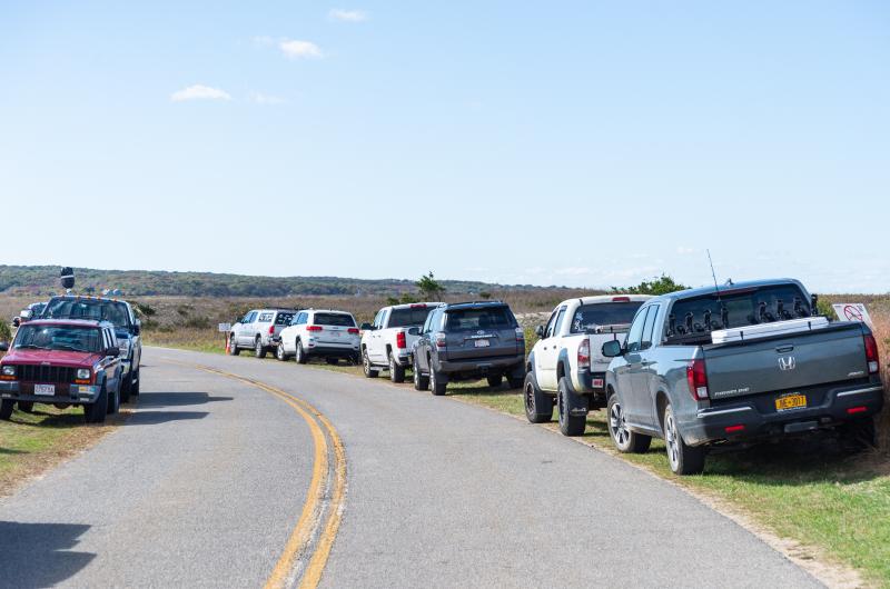 A full parking lot on West Basin Road.